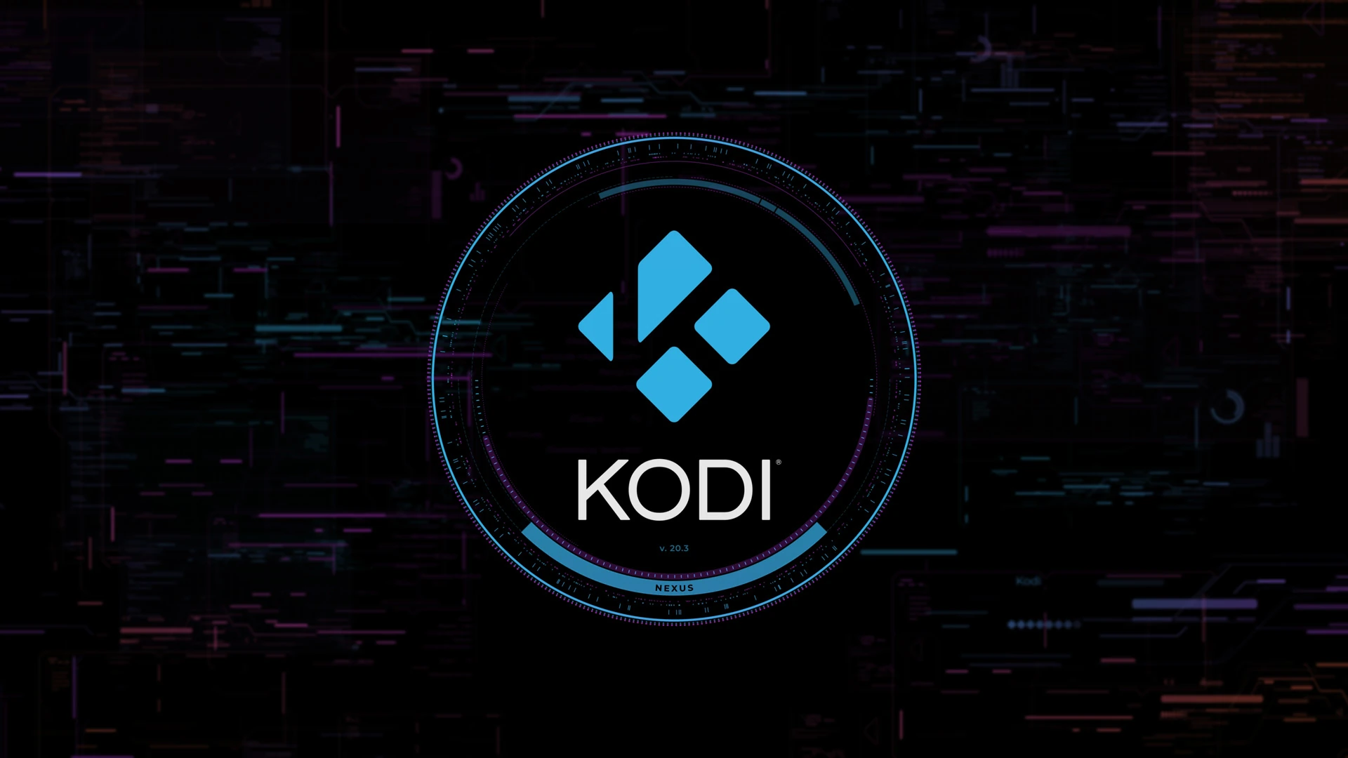 Kodi 20.3 "Nexus" Splash Screen - a blue Kodi logo sits in the centre of a black page, around it, a dial - a gauge or chronograph, perhaps.